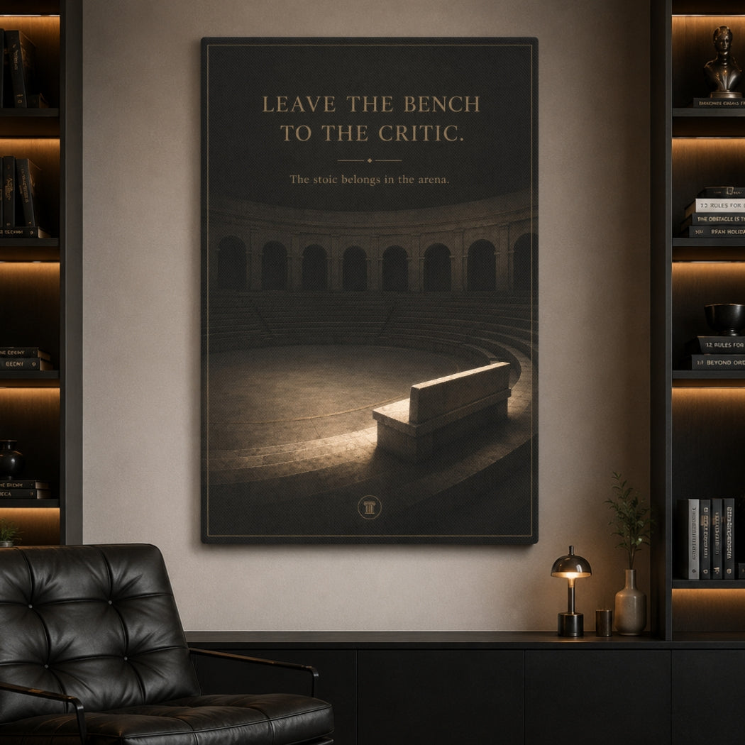 A framed art print featuring a dark stadium arena and a bench under the text 'LEAVE THE BENCH TO THE CRITIC.' displayed on a wall in a modern, dimly lit living room setting.